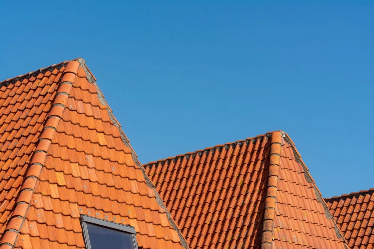 Clay barrel tile rooflines on homes in Thornton, CO